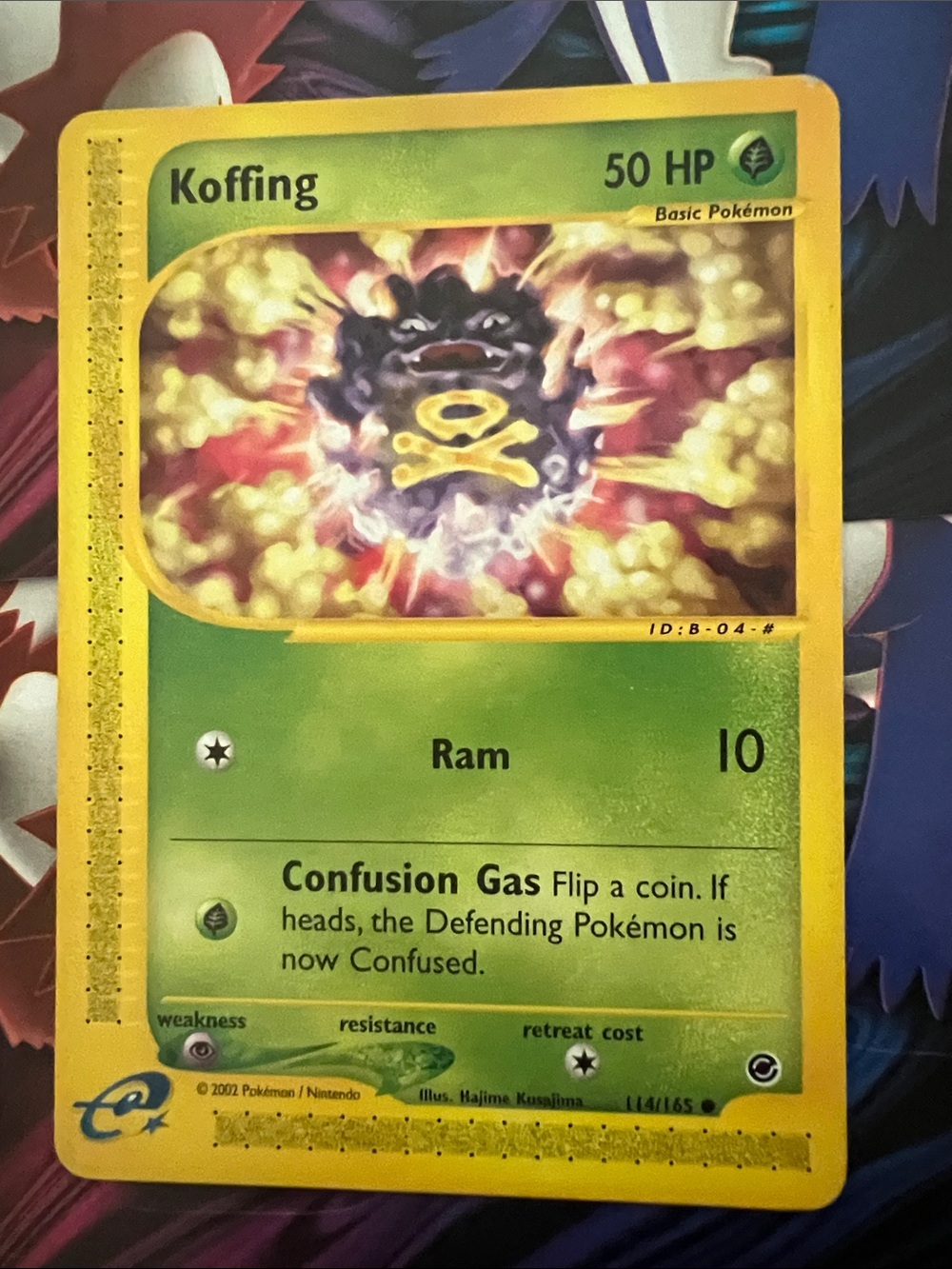 Pokemon Koffing Trading Card — Yellow with Green Accents